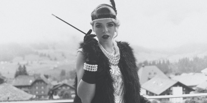 A woman wearing 1920s-era flapper formalwear