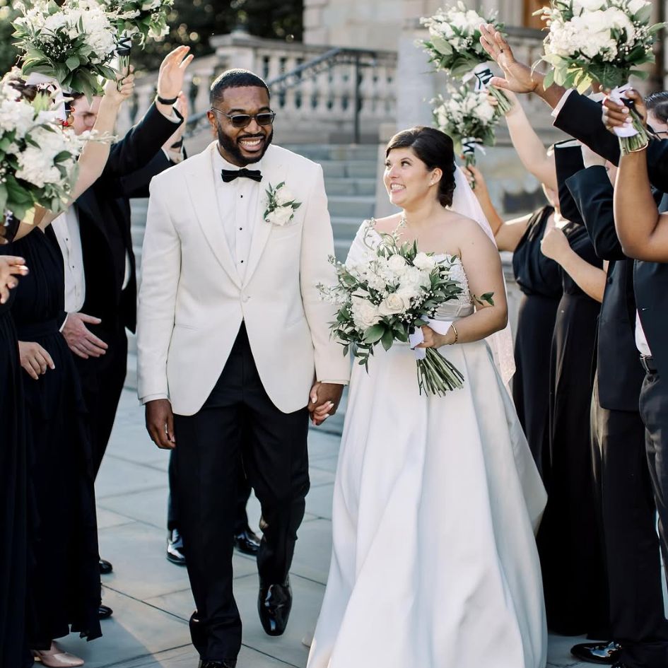 groom in perfectly fitted tuxedo rental from tuxedo by sarno
