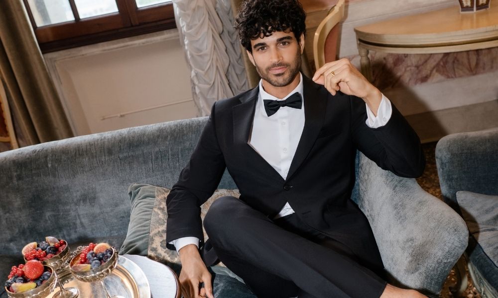 Wedding style is evolving, and 2026 is shaping up to be one of the biggest years yet for modern groom fashion. Today’s grooms are moving beyond the standard black tuxedo and embracing personal style, elevated tailoring, rich colors, and fashion-forward details that still feel timeless.