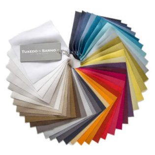 A fan of fabric swatches in various colors, ranging from white and gray to blue, green, yellow, orange, red, and brown, attached together by a small metal ring.
